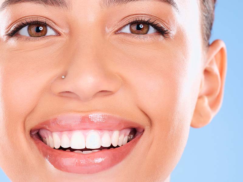 Extreme close-up portrait of a woman smiling